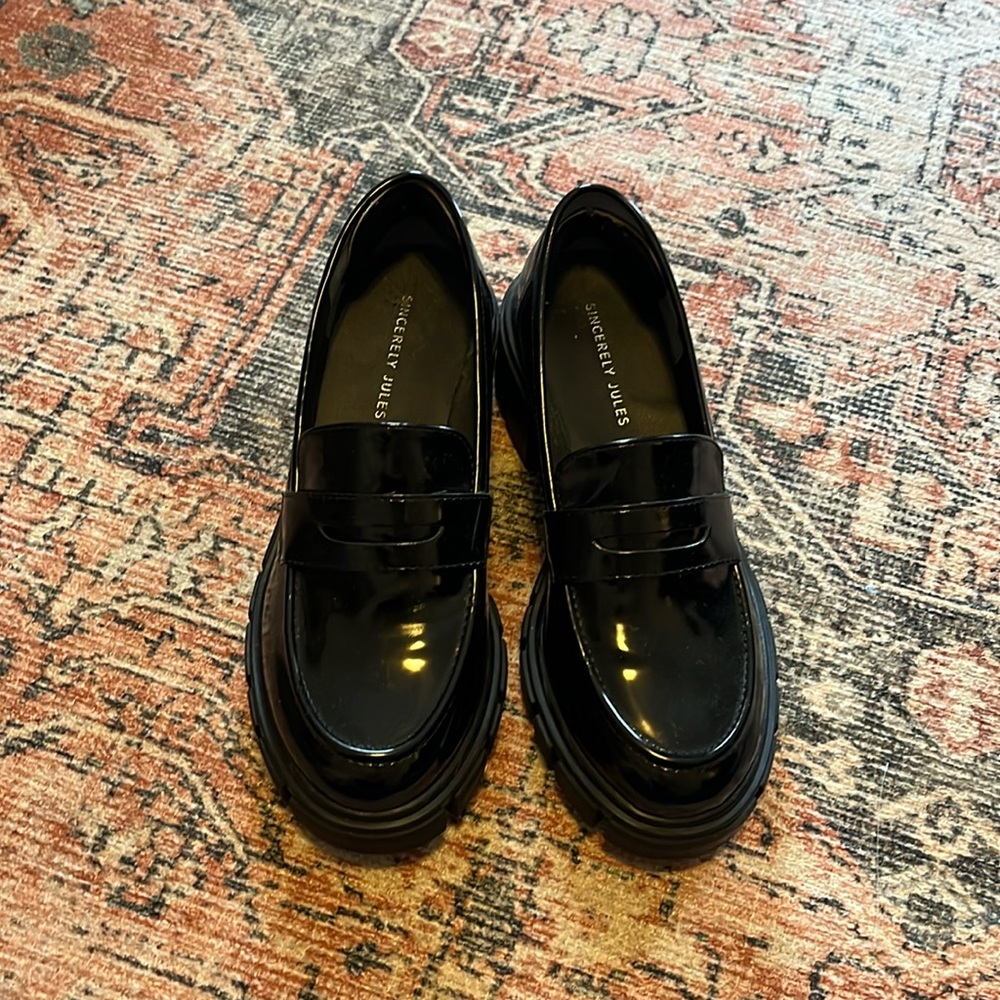 Barely worn patent leather platform loafers